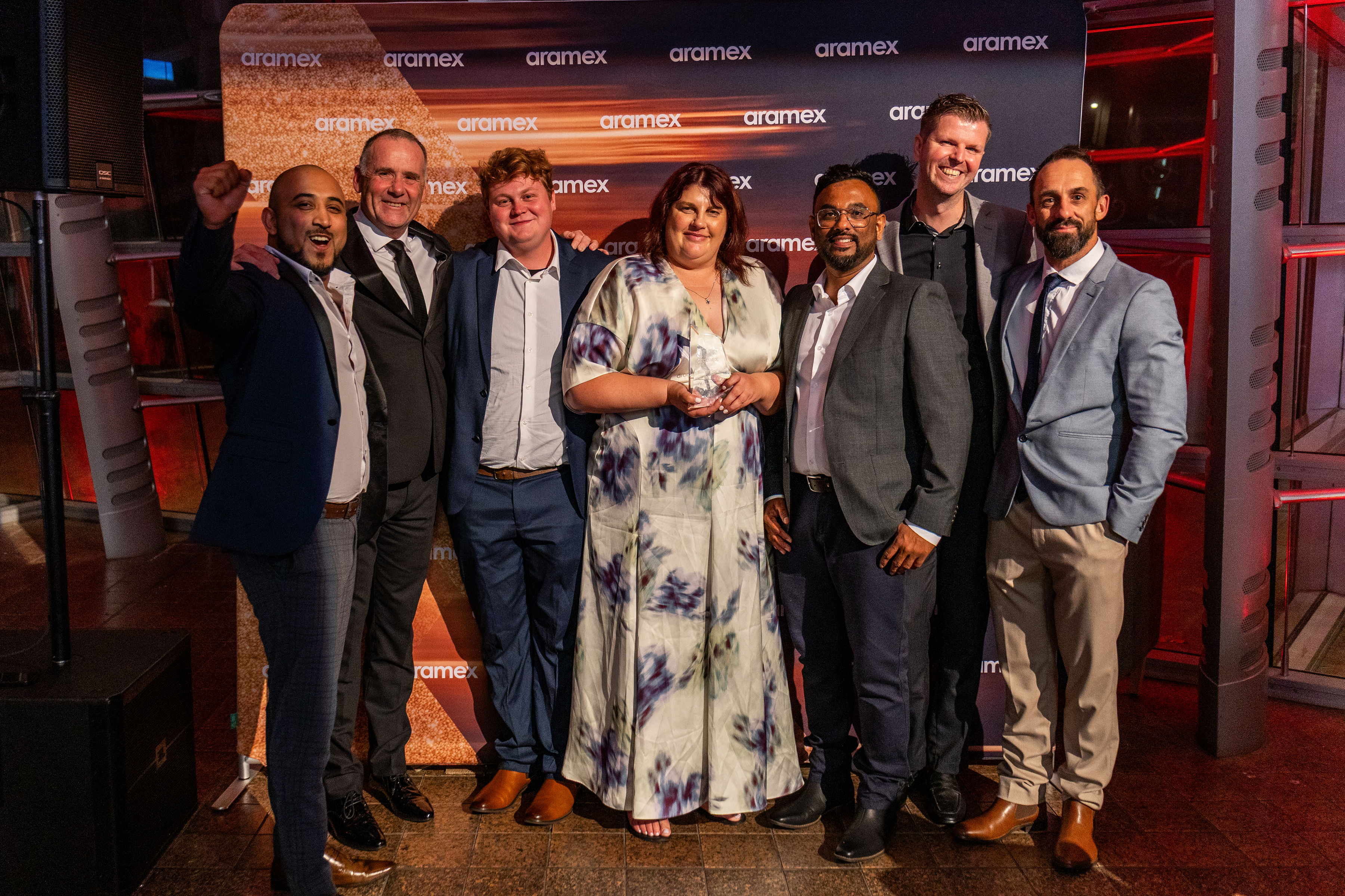 Celebrating Aramex Canterbury’s Regional Franchise of the Year award are (L-R) Timmy Sabu, Mark Little, Alexander Sutton-Dicken, Tara Lubiejewski, Buddhi Mahingoda, Quinton Cloke, Danny Murphy